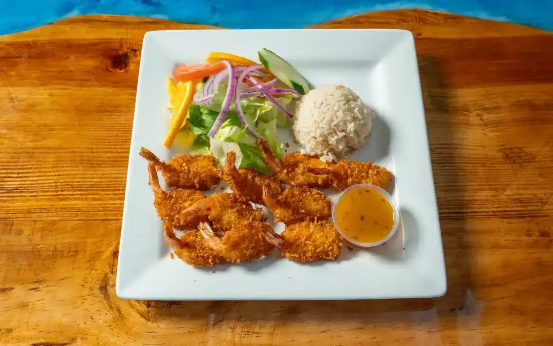 Camarones Empanizadas de Coco en salsa de Mango